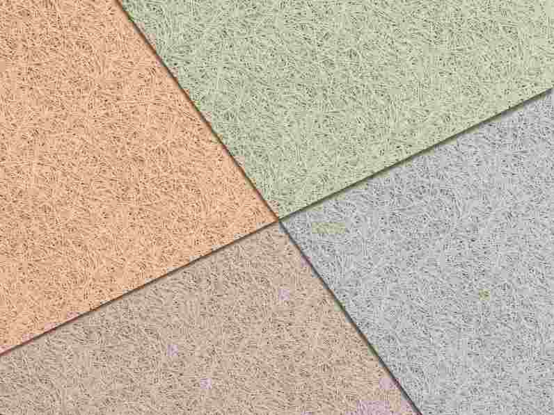 Close-up of acoustic wood wool panels in different pastel colours